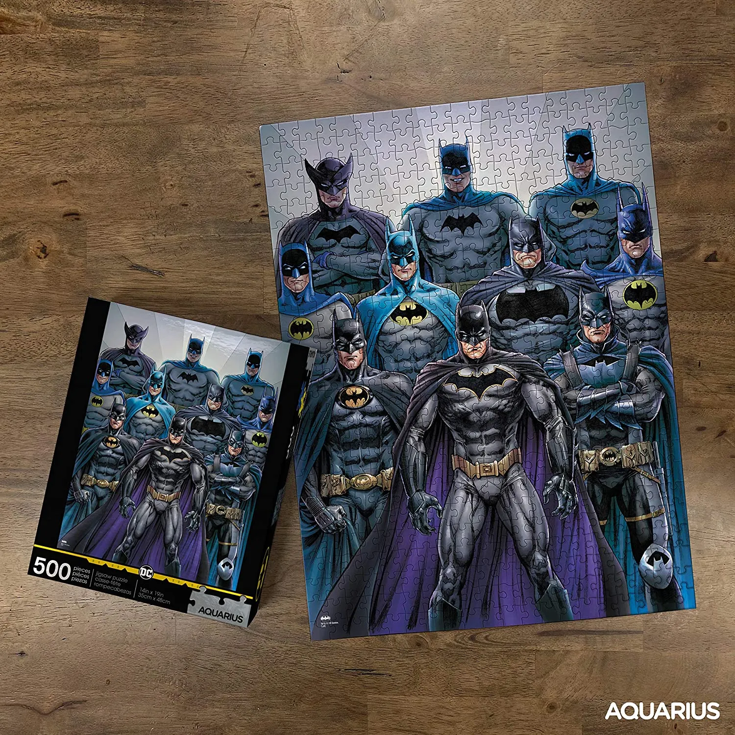 AQUARIUS DC Comics Batman Batsuits Puzzle (500 Piece Jigsaw Puzzle) - Glare Free - Precision Fit - Virtually No Puzzle Dust - Officially Licensed DC Comics Merchandise & Collectibles - 14 x 19 Inches